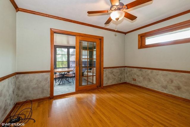 10740 S Drew St, Chicago, IL 60643 - spare room featuring wood-type flooring, healthy amount of natural light, ceiling fan, ornamental molding, and a wainscoted wall