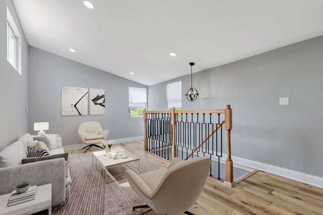 5068 W Congress Pkwy, Chicago, IL 60644 - living area featuring a chandelier, baseboards, light wood finished floors, recessed lighting, and vaulted ceiling