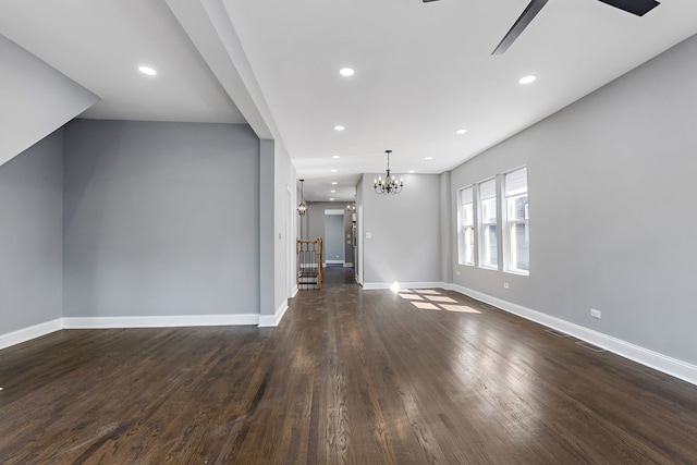 5068 W Congress Pkwy, Chicago, IL 60644 - unfurnished living room with ceiling fan, dark wood-style flooring, baseboards, a chandelier, and recessed lighting