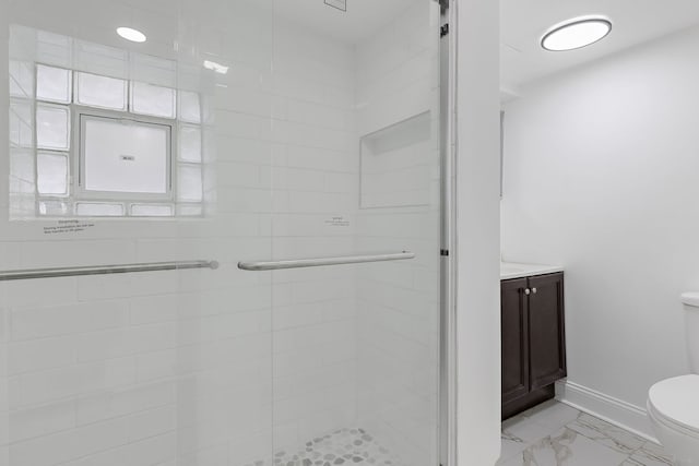 5068 W Congress Pkwy, Chicago, IL 60644 - bathroom with toilet, a stall shower, baseboards, and marble look tiles