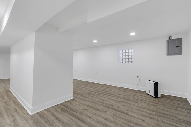 5068 W Congress Pkwy, Chicago, IL 60644 - basement with electric panel, wood finished floors, baseboards, and recessed lighting