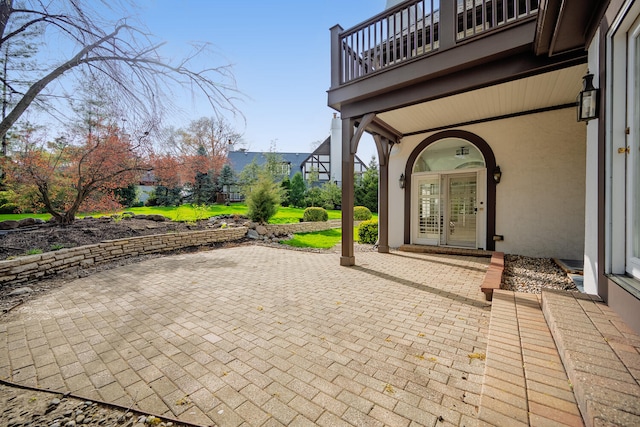 view of patio / terrace with a balcony