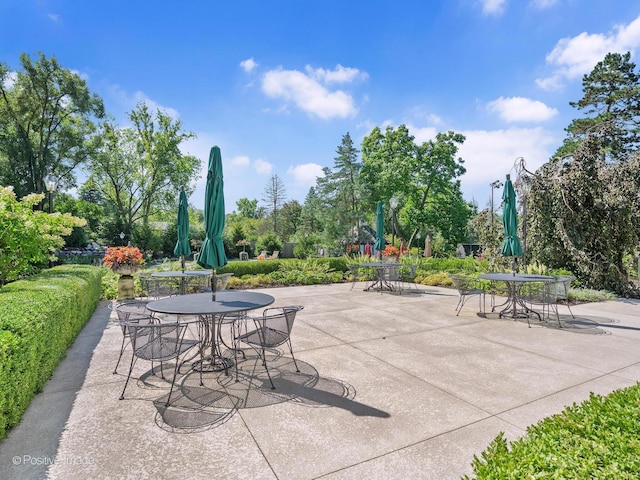 view of patio featuring outdoor dining area
