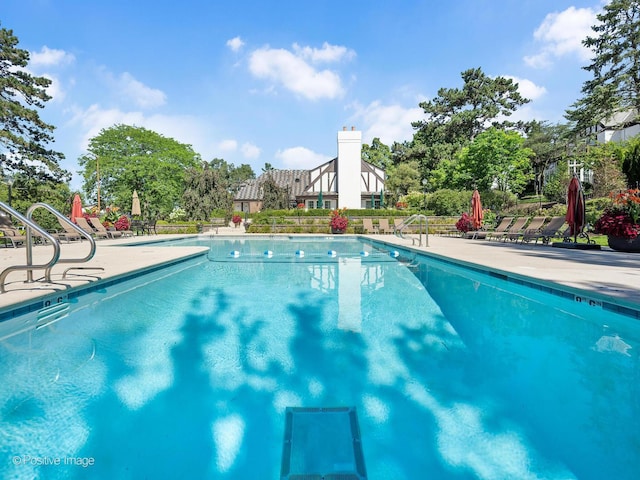 community pool with a patio