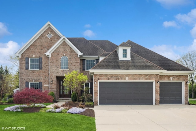 26W241 Arrow Glen Ct, Wheaton, IL 60189 - view of front of house with a garage, concrete driveway, brick siding, and a front lawn
