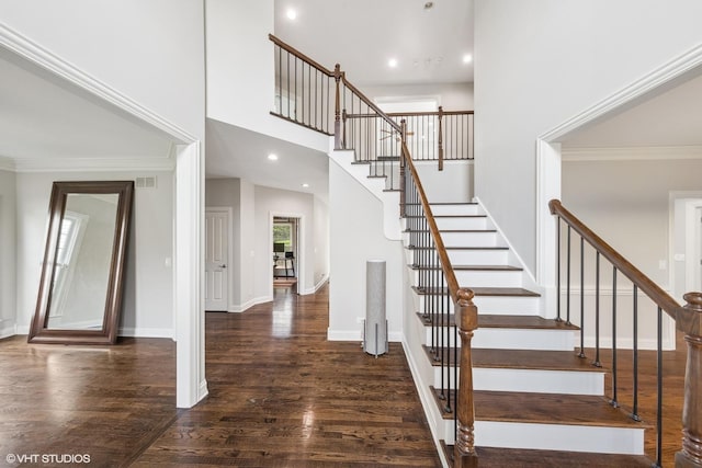 26W241 Arrow Glen Ct, Wheaton, IL 60189 - stairway featuring wood finished floors, baseboards, recessed lighting, and a towering ceiling