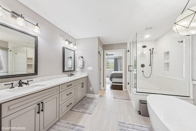 26W241 Arrow Glen Ct, Wheaton, IL 60189 - ensuite bathroom featuring tiled shower, a soaking tub, double vanity, and tile patterned floors