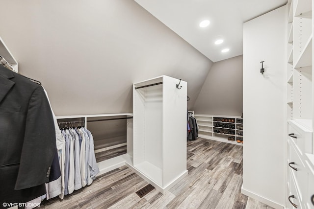 26W241 Arrow Glen Ct, Wheaton, IL 60189 - walk in closet with light wood-type flooring and lofted ceiling