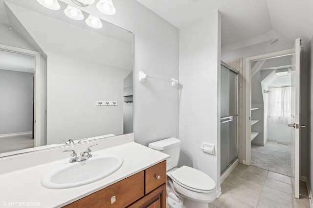 26W241 Arrow Glen Ct, Wheaton, IL 60189 - bathroom with a shower stall, toilet, vanity, and tile patterned floors