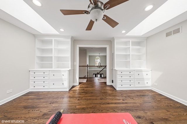 26W241 Arrow Glen Ct, Wheaton, IL 60189 - exercise room with baseboards, a ceiling fan, built in shelves, dark wood finished floors, and recessed lighting