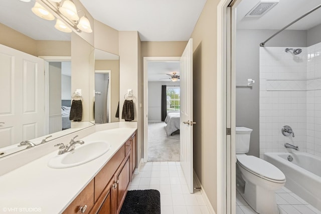 26W241 Arrow Glen Ct, Wheaton, IL 60189 - ensuite bathroom featuring tile patterned flooring, toilet, vanity, and shower / tub combination