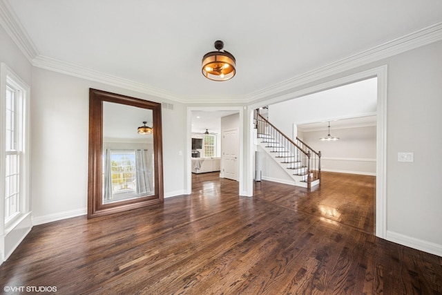 26W241 Arrow Glen Ct, Wheaton, IL 60189 - unfurnished living room featuring a chandelier, wood finished floors, ornamental molding, and baseboards