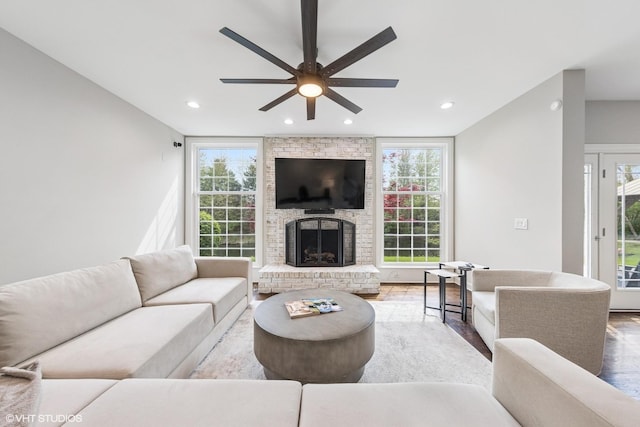 26W241 Arrow Glen Ct, Wheaton, IL 60189 - living room with wood finished floors, a ceiling fan, recessed lighting, and a brick fireplace