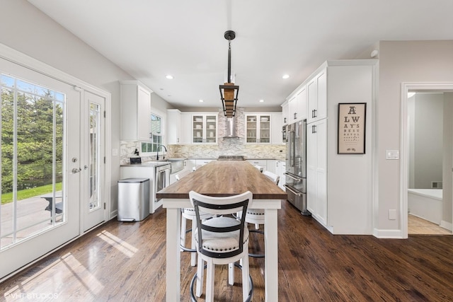 26W241 Arrow Glen Ct, Wheaton, IL 60189 - kitchen with wood counters, stainless steel appliances, backsplash, white cabinets, and recessed lighting
