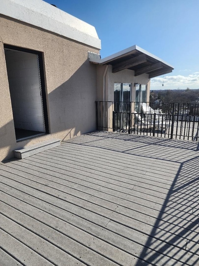 5975 N Odell Ave Unit 2C, Chicago, IL 60631 - wooden deck featuring fence and a residential view