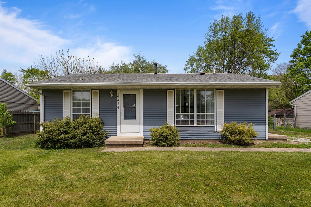3214 York Dr, Champaign, IL 61821 - single story home with fence and a front lawn