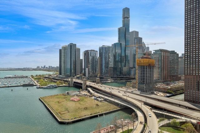 property's view of city with a water view