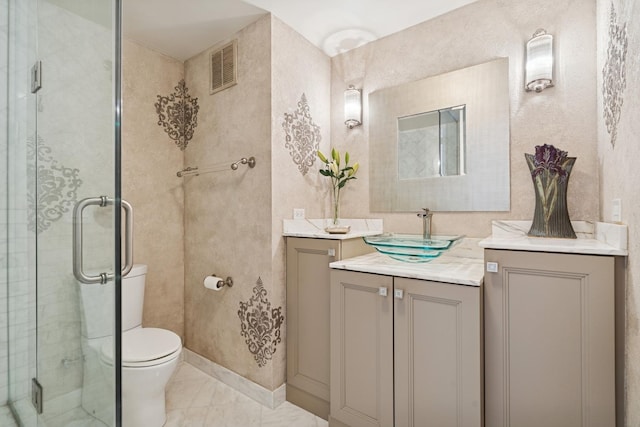 full bath featuring vanity, visible vents, and a stall shower