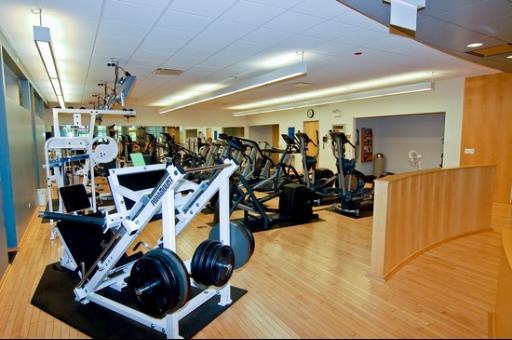 workout area featuring wood finished floors
