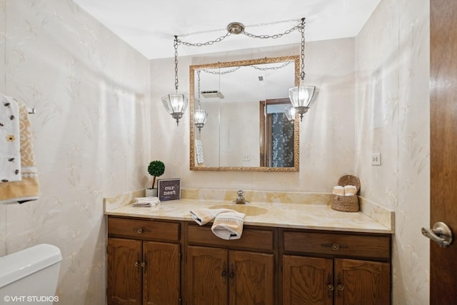 515 S Inner Circle Dr, Mount Prospect, IL 60056 - bathroom with vanity, visible vents, and toilet