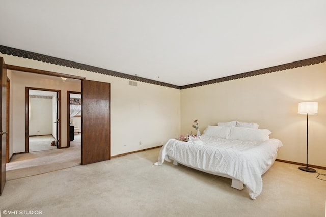 515 S Inner Circle Dr, Mount Prospect, IL 60056 - bedroom with baseboards, visible vents, and light carpet
