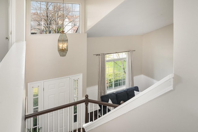553 Ivory Ln, Bartlett, IL 60103 - stairs featuring a high ceiling and a notable chandelier