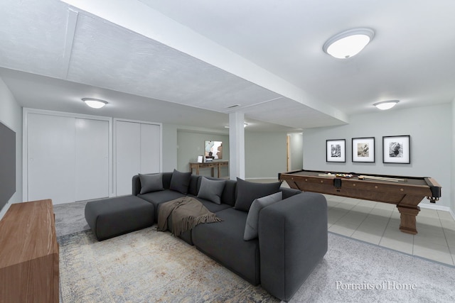 tiled living area with baseboards, billiards, and carpet