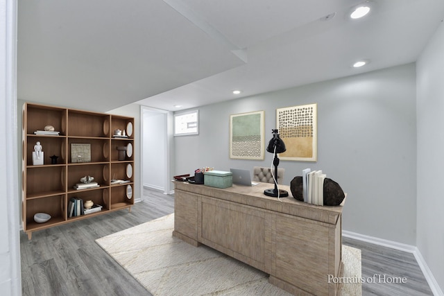 home office featuring baseboards, recessed lighting, and wood finished floors