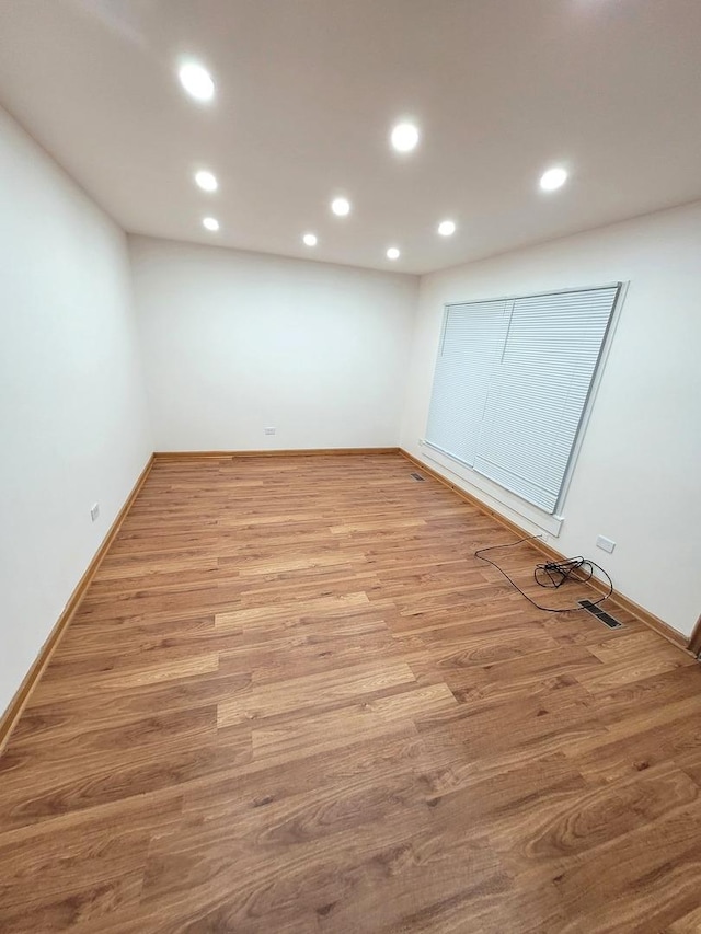 957 Harvard Ln, Matteson, IL 60443 - below grade area featuring recessed lighting, baseboards, and light wood finished floors