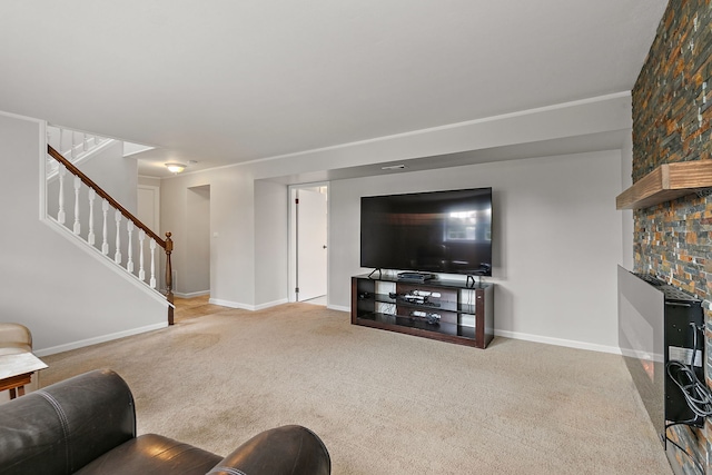 carpeted living room with stairway and baseboards