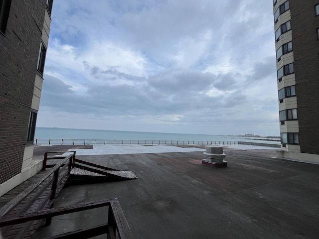 view of patio / terrace featuring a water view
