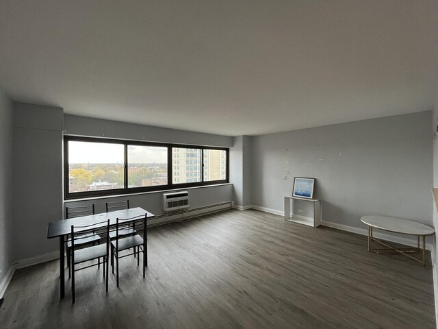 7337 S S Shore Dr Unit 1024, Chicago, IL 60649 - dining room featuring dark wood finished floors and baseboards