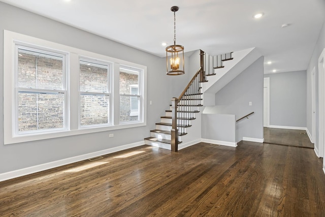 interior space with recessed lighting, baseboards, dark wood-style floors, and stairway