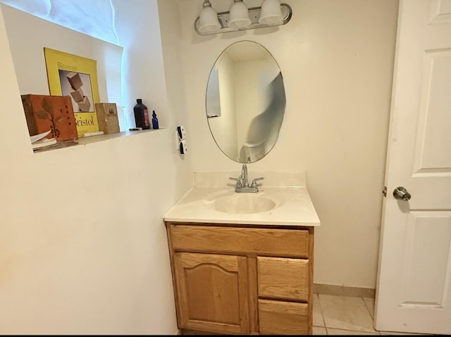 bathroom with vanity and tile patterned flooring