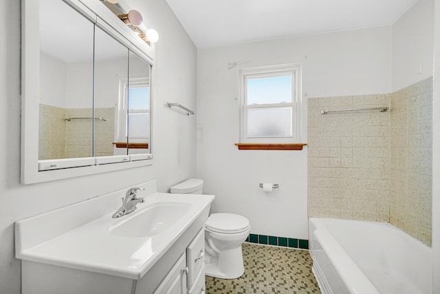 bathroom with vanity, baseboards, toilet, and a wealth of natural light