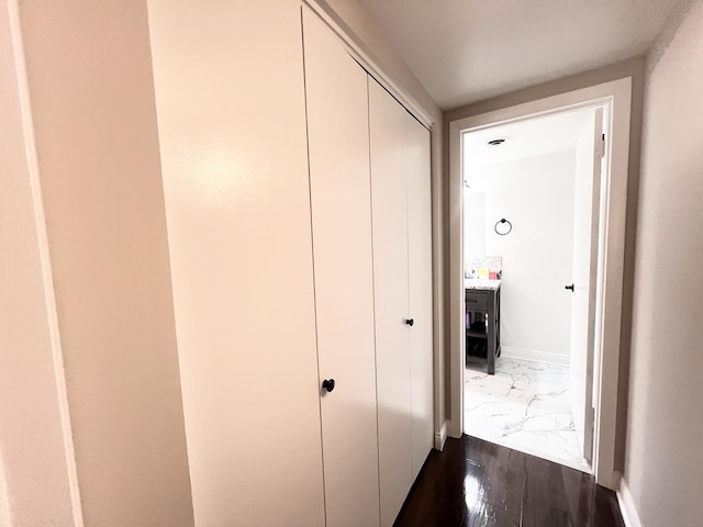 3240 N Manor Dr Unit 130, Lansing, IL 60438 - hallway featuring baseboards and marble finish floor