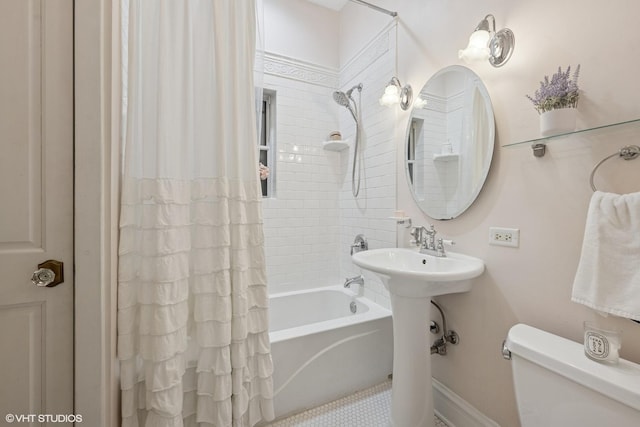 bedroom with a ceiling fan, ornamental molding, and wood finished floors