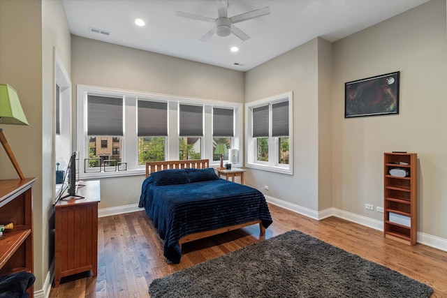 4336 N Troy St, Chicago, IL 60618 - bedroom with baseboards, recessed lighting, and wood finished floors