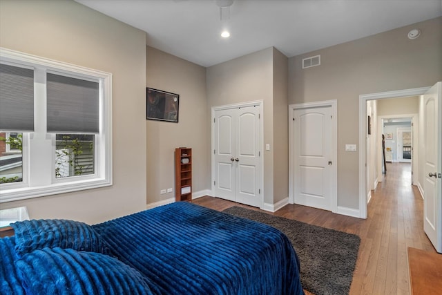 4336 N Troy St, Chicago, IL 60618 - bedroom featuring visible vents, recessed lighting, baseboards, and hardwood / wood-style floors