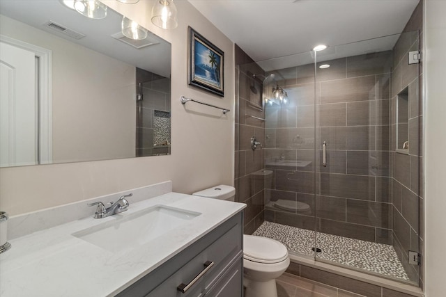 4336 N Troy St, Chicago, IL 60618 - full bathroom featuring vanity, toilet, visible vents, and a stall shower