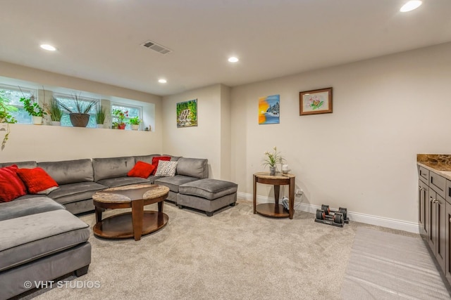 4336 N Troy St, Chicago, IL 60618 - living area with recessed lighting, baseboards, visible vents, and light colored carpet