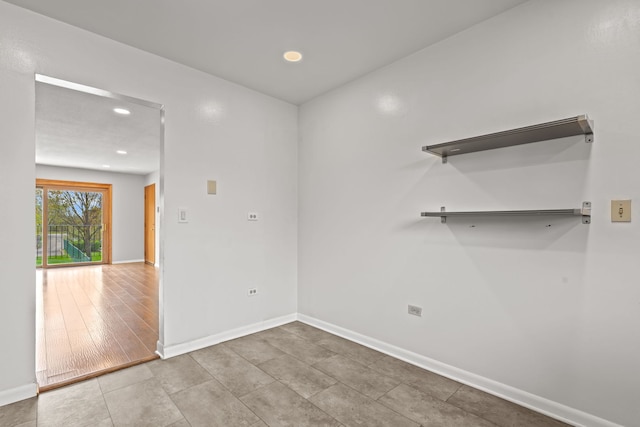 704 Cobblestone Cir Unit D, Glenview, IL 60025 - spare room with recessed lighting, baseboards, and tile patterned floors