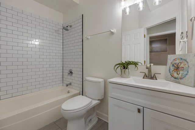 full bathroom featuring toilet,  shower combination, and vanity