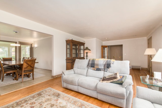 2001 Woodland Ave, Park Ridge, IL 60068 - living room featuring crown molding, baseboards, wood finished floors, and visible vents