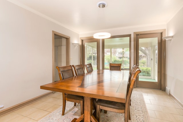 2001 Woodland Ave, Park Ridge, IL 60068 - dining area with light tile patterned floors, baseboards, and ornamental molding