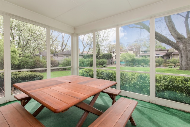 2001 Woodland Ave, Park Ridge, IL 60068 - sunroom / solarium with plenty of natural light, carpet, and outdoor dining space