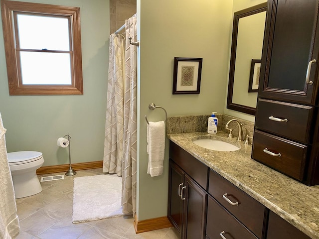 1994 Brentwood Ln, Wheaton, IL 60189 - full bathroom featuring vanity, toilet, tile patterned floors, baseboards, and visible vents