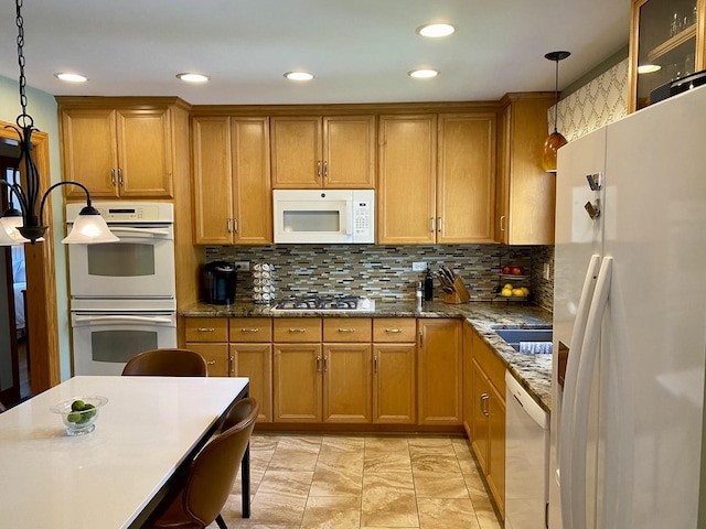 1994 Brentwood Ln, Wheaton, IL 60189 - kitchen with white appliances, brown cabinets, pendant lighting, and decorative backsplash