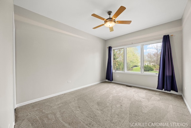 2716 Whitchurch Ct, Naperville, IL 60564 - empty room with carpet floors, ceiling fan, baseboards, and visible vents