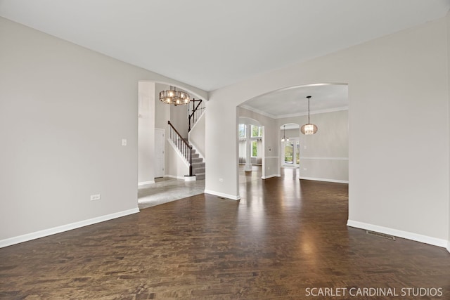 2716 Whitchurch Ct, Naperville, IL 60564 - unfurnished living room with baseboards, arched walkways, wood finished floors, and a notable chandelier